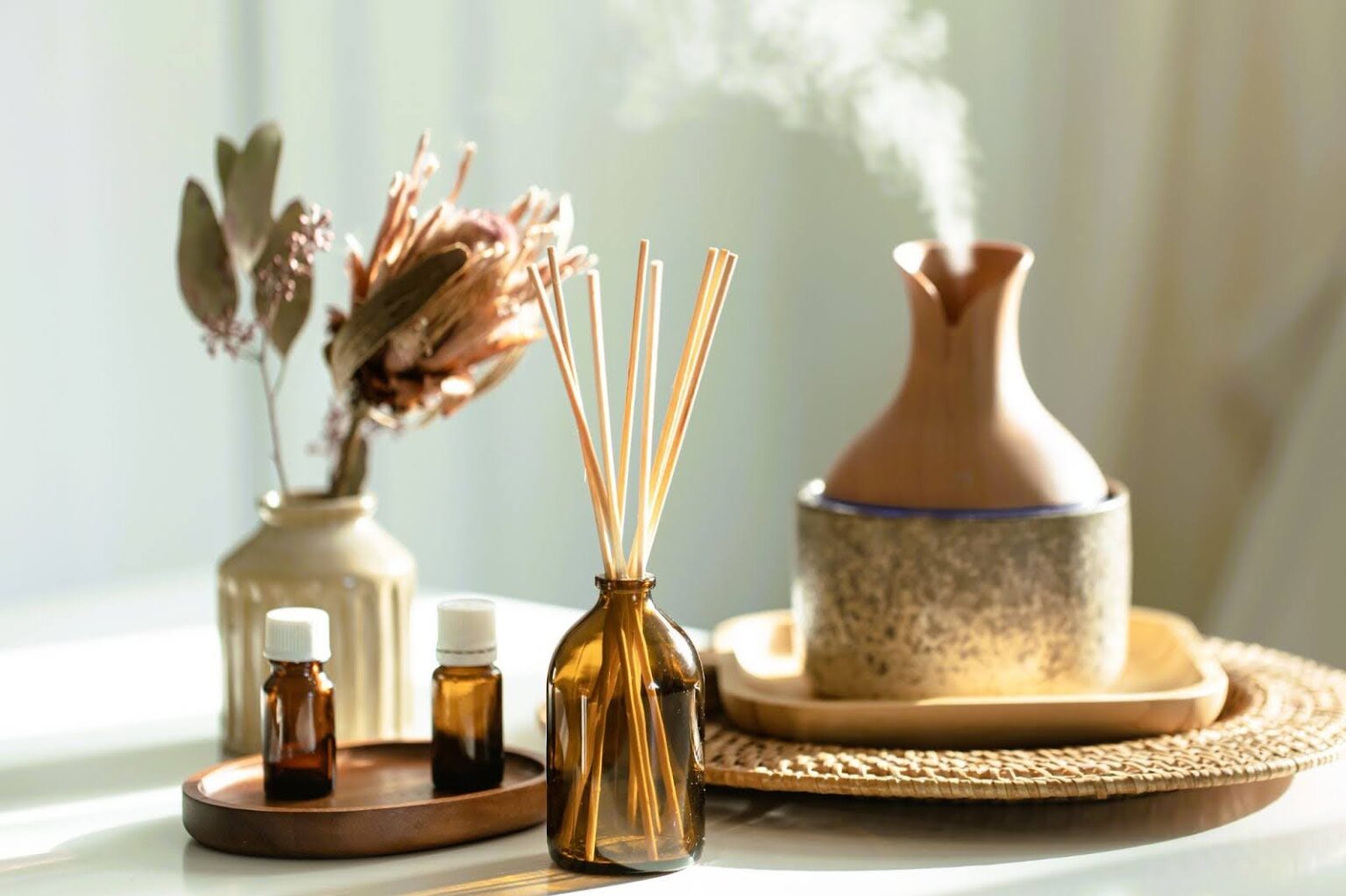 Array of oils and diffusor for aromatherapy, perfect for infrared sauna session